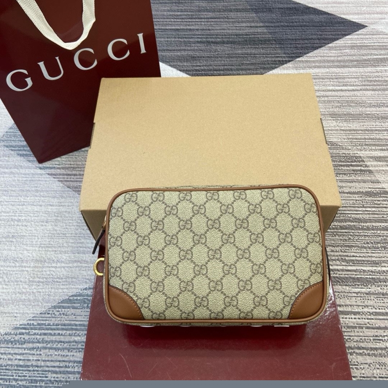 G*u*i clutch bags